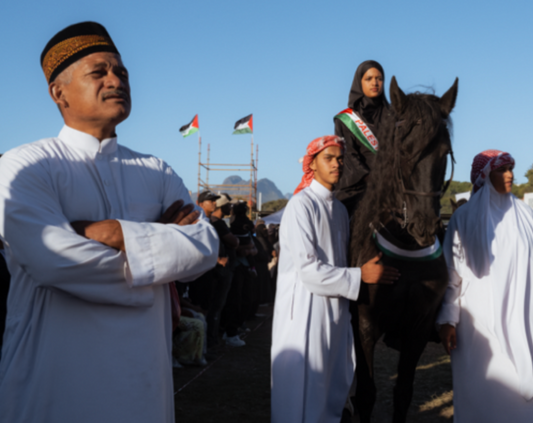 Nazeem Anthony and his children, Umar, Aamina and Tasneem with Jolene. Kramat Festival, Sandvlei